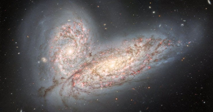 ‘Cosmic butterfly’ wings shimmer in image of violently colliding galaxies